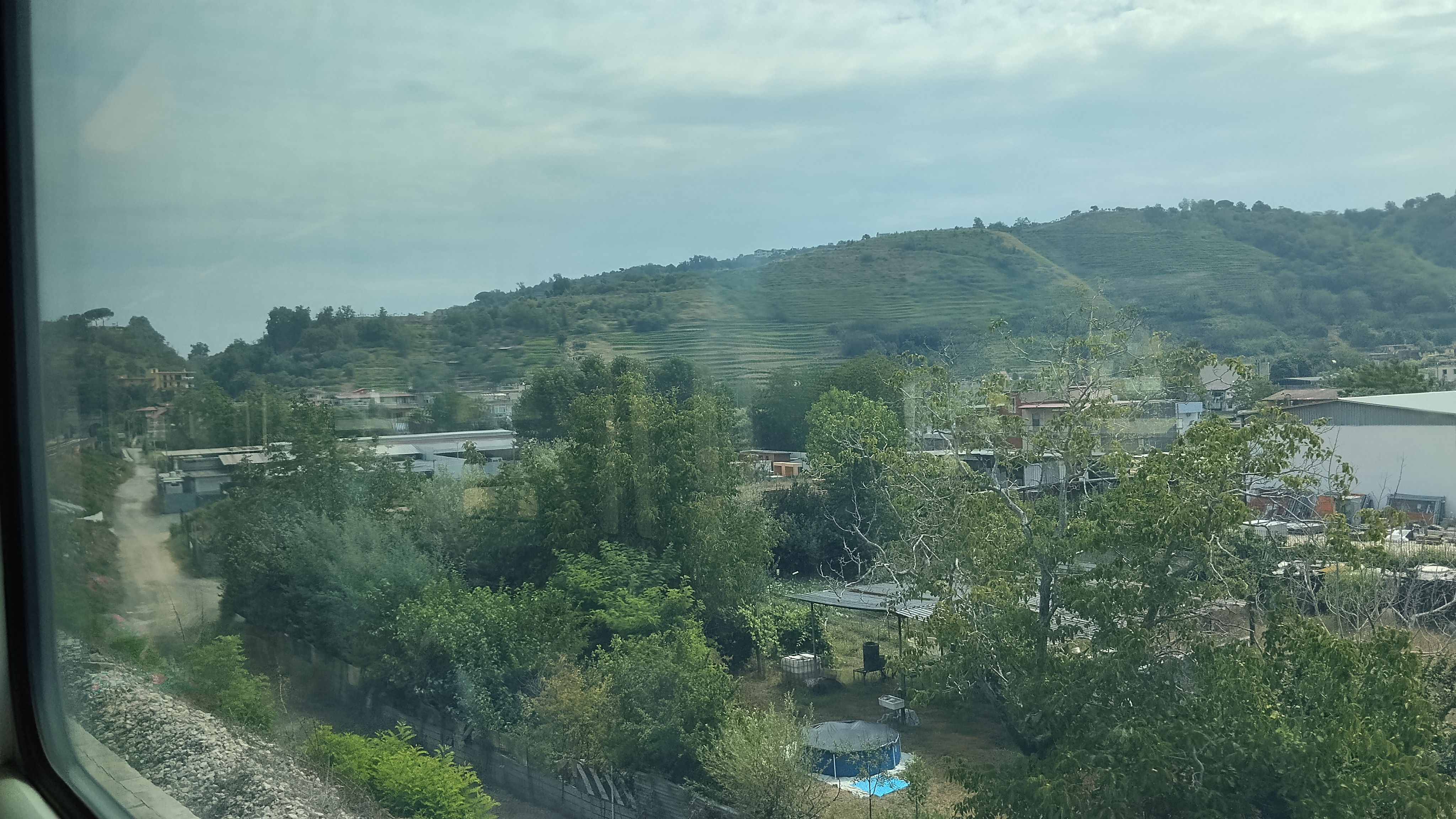 Part of the Pisani area, mostly green and with storage areas and some sparse buildings in it Part of the Pisani area, mostly green and with storage areas and some sparse buildings in it